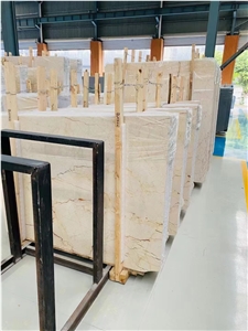 Sofitel Gold Marble Golden Crema Eva Menes Slab Tile