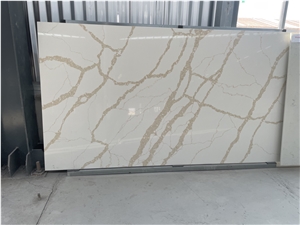 Calacatta Quartz Slab With Fractured Golden Veins
