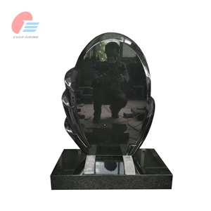 Black Granite Headstone With Lily Carving