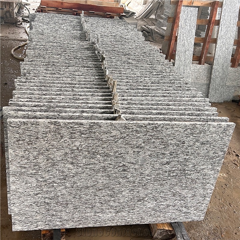 Spray White Granite Tiles And Slabs