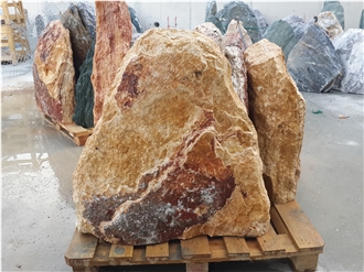 Gold Finch Travertine Boulder Headstone