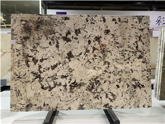 Saussurea Sunset Snow Bianco Antico Granite Slabs