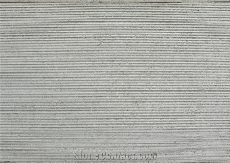 Corduroy / Rifel Vratza Limestone Combed Facade