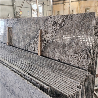 White Torroncino Granite Slabs
