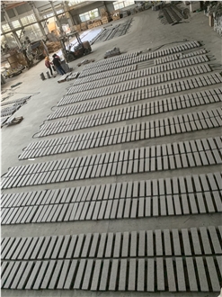 Porphyry Paving Stone Highlighting Mixed Grain Sizes