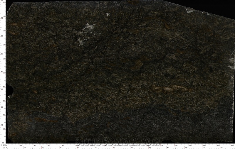 Kozmus Granite Slabs Exhibiting Layered Dark Surface