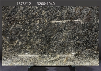 Kozmus Granite Slabs Revealing Striking Dark Surface Details