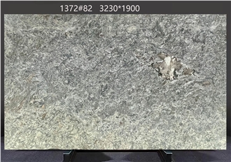 Kozmus Granite Tiles Featuring Bold Dark Color Contrasts