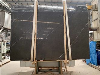 Pietra Grey Marble Slabs Revealing Crisscross Veins