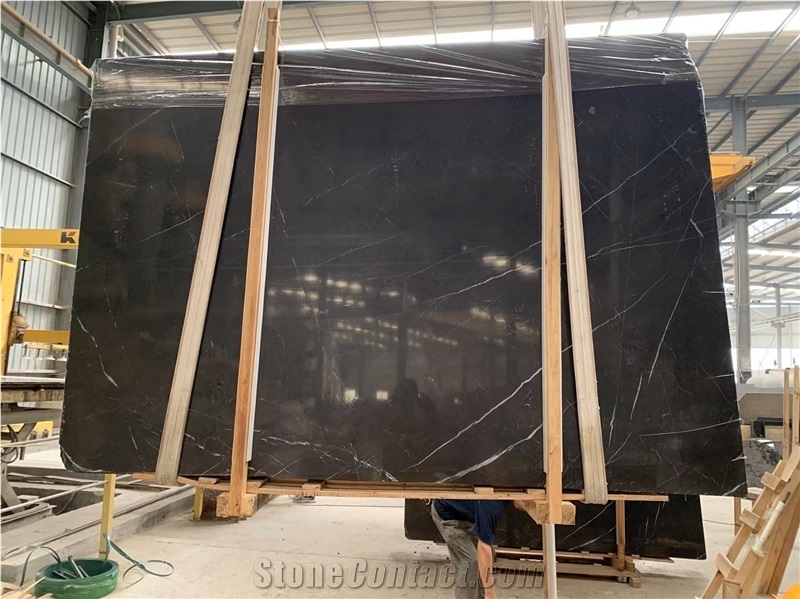 Pietra Grey Marble Tiles Featuring Intertwined Veins