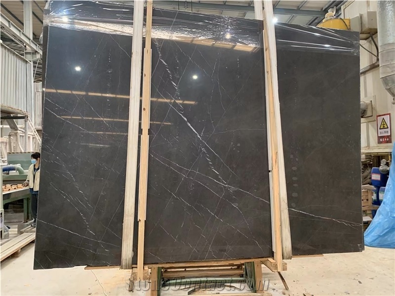 Pietra Grey Marble Tiles Featuring Intertwined Veins