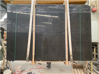 Pietra Grey Marble Tiles Featuring Intertwined Veins
