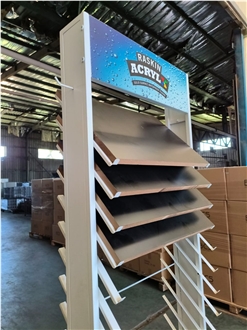 Multi-Layered Metal Display Rack With Tilted Shelves