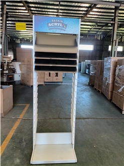 Multi-Layered Metal Display Rack With Tilted Shelves