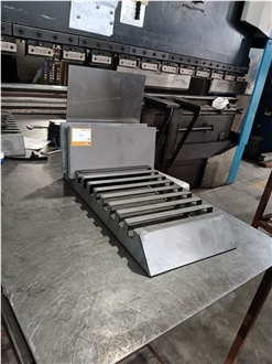 Multi-Slot Metal Display Rack With Angled Shelves