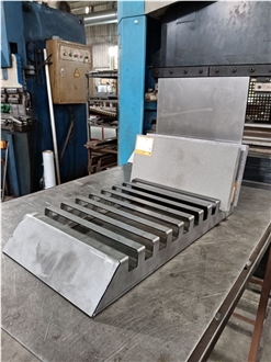 Multi-Slot Metal Display Rack With Angled Shelves