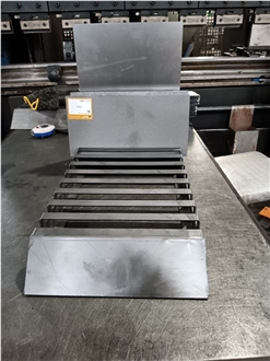 Multi-Slot Metal Display Rack With Angled Shelves