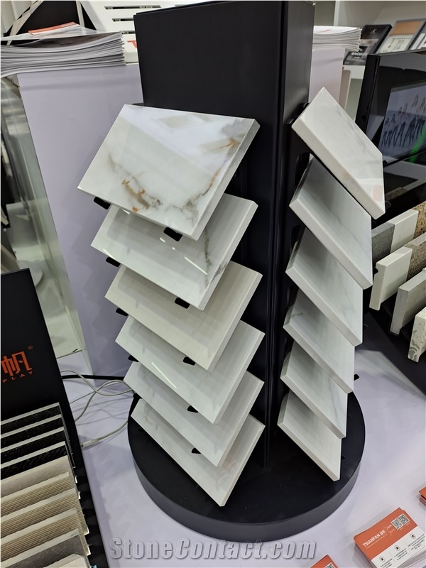 Rotating Multi-Layered Display Rack With Tilted Shelves