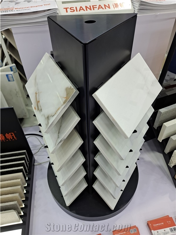 Rotating Multi-Layered Display Rack With Tilted Shelves