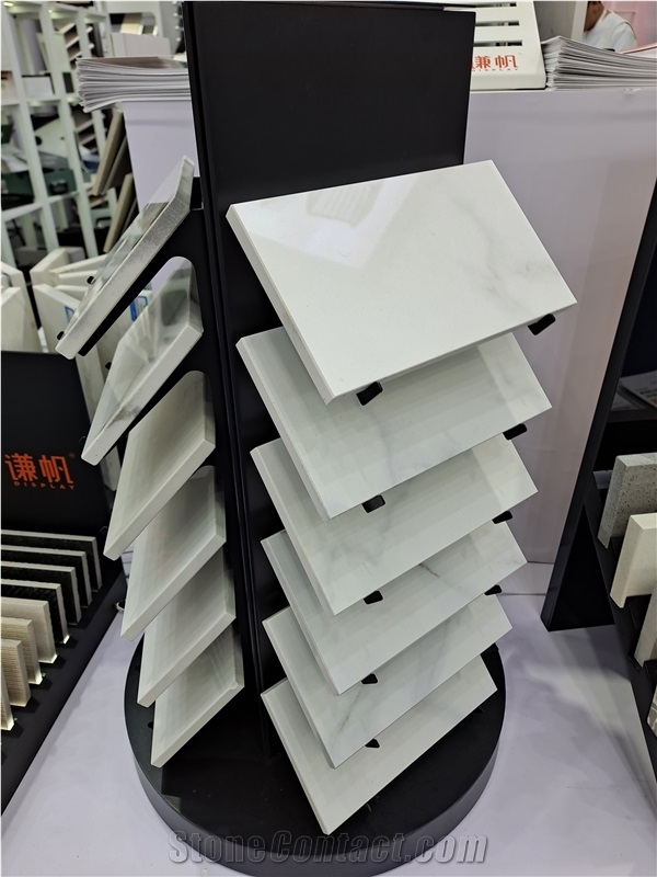 Rotating Multi-Layered Display Rack With Tilted Shelves