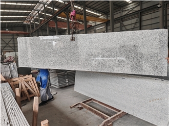 China Polished Ivory White Granite Slabs