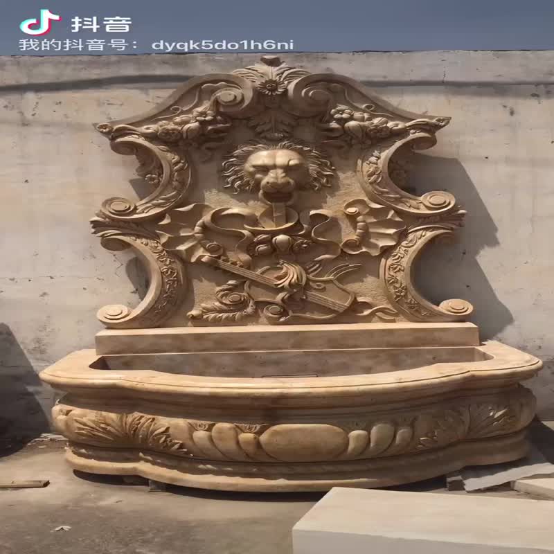 Brown marble lion head carving wall fountain001
