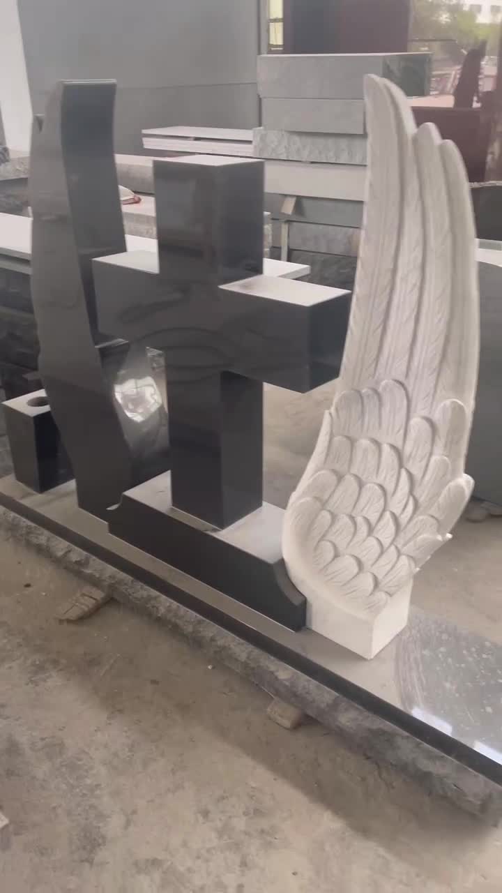 Black Granite Cross Tombstone With White Marble Carved Wings